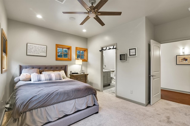 19727 Country Lake Dr, Magnolia, TX 77355 - bedroom featuring light carpet, baseboards, ensuite bath, recessed lighting, and a ceiling fan