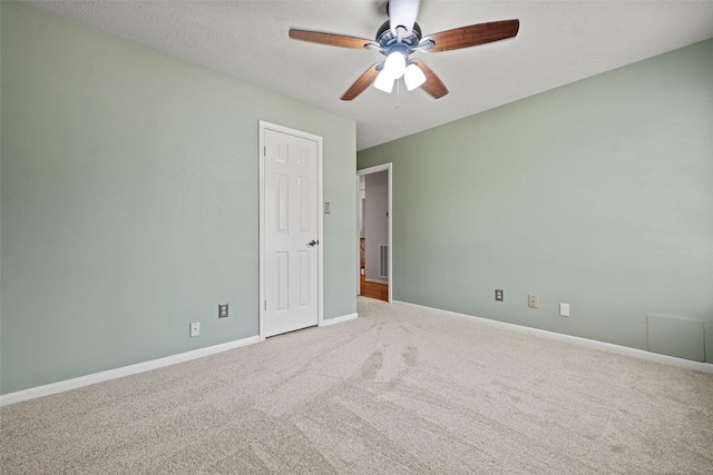 10255 Crooks Way Ct, Houston, TX 77065 - empty room with carpet floors, a ceiling fan, and baseboards