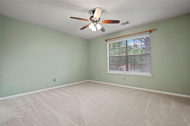 10255 Crooks Way Ct, Houston, TX 77065 - spare room featuring baseboards, carpet, ceiling fan, and a textured ceiling