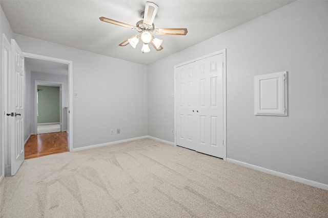 10255 Crooks Way Ct, Houston, TX 77065 - unfurnished bedroom featuring carpet floors, baseboards, a closet, and ceiling fan