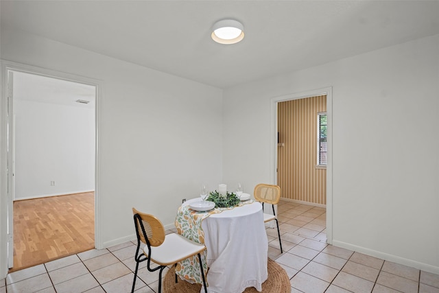 10255 Crooks Way Ct, Houston, TX 77065 - dining room with light tile patterned flooring and baseboards