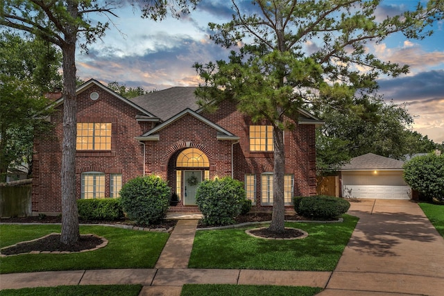 10255 Crooks Way Ct, Houston, TX 77065 - traditional-style house with brick siding, a garage, a yard, an outbuilding, and concrete driveway