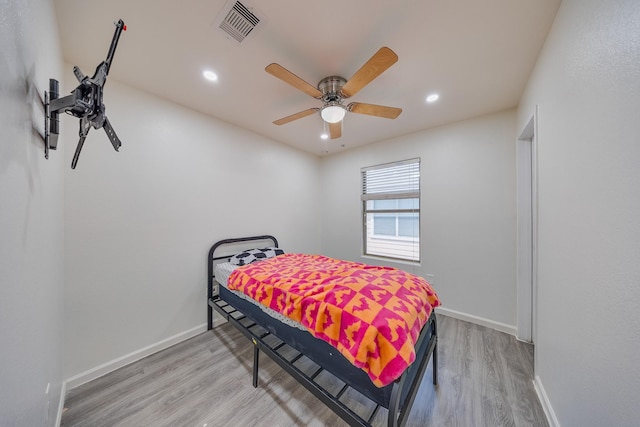 19314 Cactus Thorn Dr, Cypress, TX 77433 - bedroom featuring light wood-style floors, baseboards, recessed lighting, and a ceiling fan