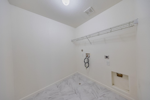 19314 Cactus Thorn Dr, Cypress, TX 77433 - washroom featuring hookup for an electric dryer, light marble finish flooring, hookup for a washing machine, baseboards, and hookup for a gas dryer