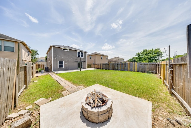 19314 Cactus Thorn Dr, Cypress, TX 77433 - back of house featuring a fire pit and a patio area