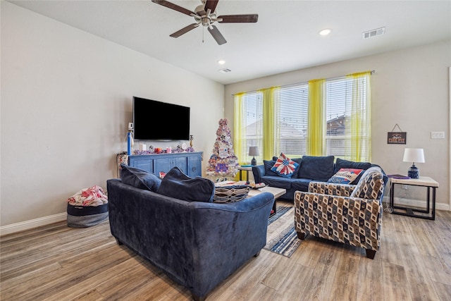 12402 Oakleaf Bend Dr, Humble, TX 77346 - living area with wood finished floors, ceiling fan, baseboards, and recessed lighting