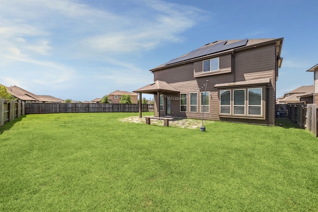 12402 Oakleaf Bend Dr, Humble, TX 77346 - back of house with a gazebo, solar panels, and a patio