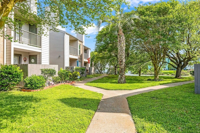 3220 69th St Unit K6, Galveston, TX 77551 - view of home's community with a lawn