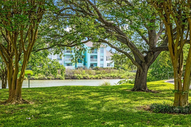 3220 69th St Unit K6, Galveston, TX 77551 - view of grassy yard with a water view