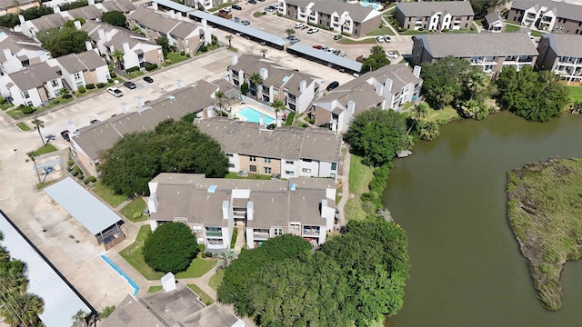 3220 69th St Unit K6, Galveston, TX 77551 - aerial view of property's location featuring a nearby body of water, nearby suburban area, and a pool area