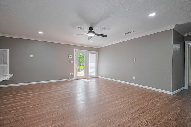 11903 Atwell Dr, Houston, TX 77035 - empty room with ceiling fan, ornamental molding, wood finished floors, baseboards, and recessed lighting