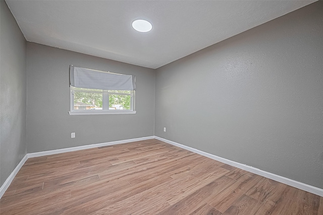 11903 Atwell Dr, Houston, TX 77035 - spare room featuring light wood-style flooring and baseboards