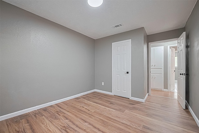 11903 Atwell Dr, Houston, TX 77035 - unfurnished bedroom featuring light wood-style floors and baseboards