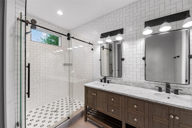 1412 Weiss St, Houston, TX 77009 - full bath with a shower stall, double vanity, and tile walls