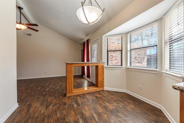 1705 Bimini Way, Seabrook, TX 77586 - empty room featuring vaulted ceiling, wood finished floors, ceiling fan, and baseboards