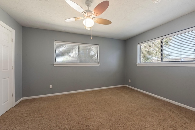 1705 Bimini Way, Seabrook, TX 77586 - carpeted spare room featuring plenty of natural light, ceiling fan, and baseboards