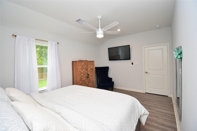 1202 Fort St, Richmond, TX 77469 - bedroom featuring dark wood-style flooring, baseboards, a ceiling fan, recessed lighting, and vaulted ceiling