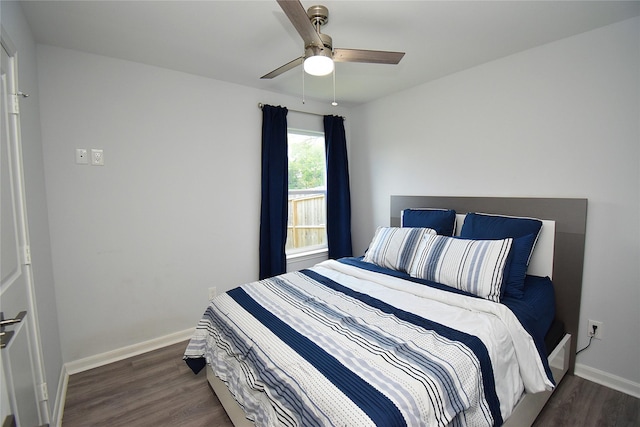 1202 Fort St, Richmond, TX 77469 - bedroom with wood finished floors, baseboards, and ceiling fan
