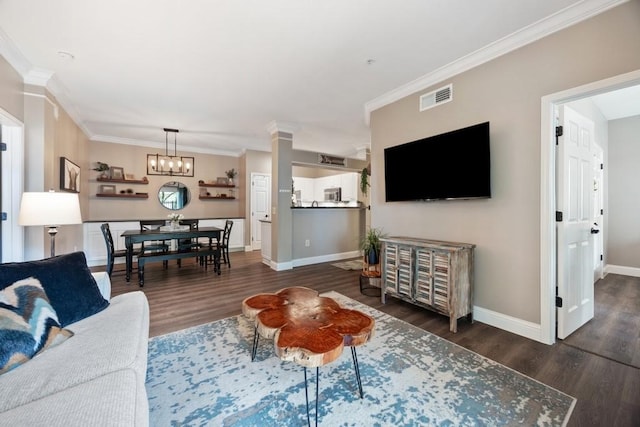 3231 Allen Pkwy Unit 6106, Houston, TX 77019 - living room featuring wood finished floors, baseboards, ornamental molding, and a chandelier