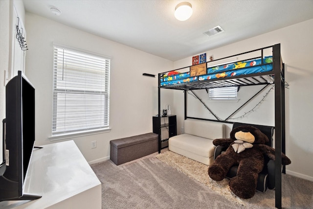 17303 Rock Willow Ln, Tomball, TX 77377 - bedroom featuring carpet, baseboards, and multiple windows