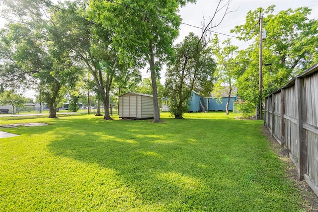 4801 36th St, Dickinson, TX 77539 - view of yard with a storage shed and an outbuilding