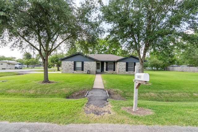 4801 36th St, Dickinson, TX 77539 - single story home featuring a front lawn and stone siding