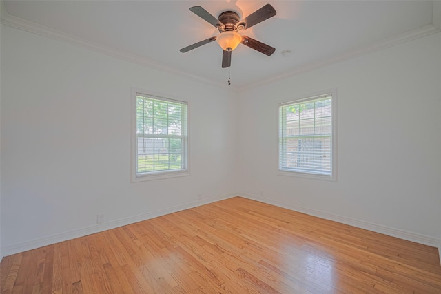 3042 Oak Forest Dr, Houston, TX 77018 - empty room with light wood-style flooring, ornamental molding, baseboards, and ceiling fan