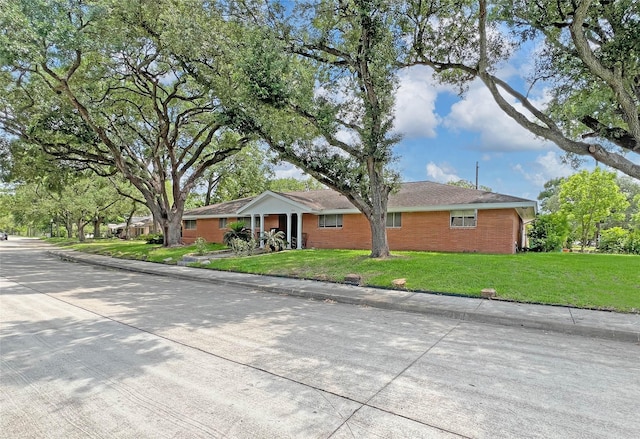3641 Deal St, Houston, TX 77025 - ranch-style home with a front yard and brick siding