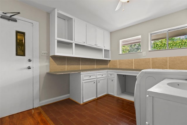 3641 Deal St, Houston, TX 77025 - laundry area featuring dark wood-style flooring and a sink