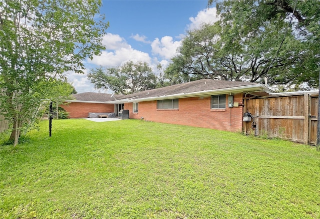 3641 Deal St, Houston, TX 77025 - back of property with a patio and brick siding