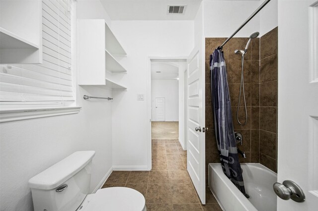 4663 Rockton Hills Ln, Sugar Land, TX 77479 - full bathroom with toilet, shower / bath combination with curtain, tile patterned flooring, and baseboards