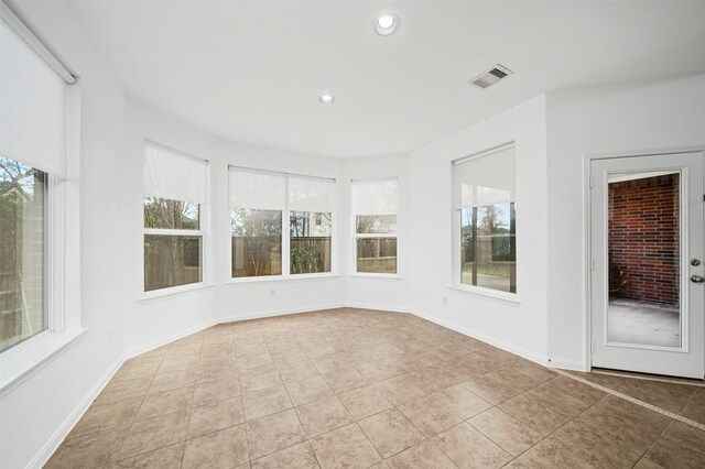 4663 Rockton Hills Ln, Sugar Land, TX 77479 - unfurnished sunroom with recessed lighting, tile patterned floors, and baseboards