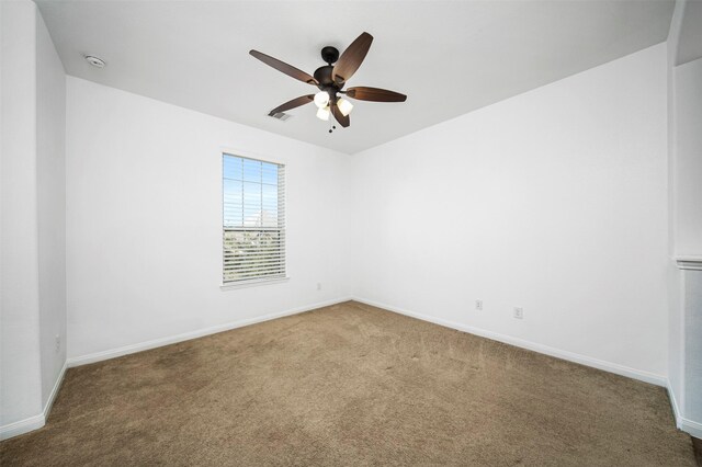 4663 Rockton Hills Ln, Sugar Land, TX 77479 - carpeted spare room featuring a ceiling fan and baseboards