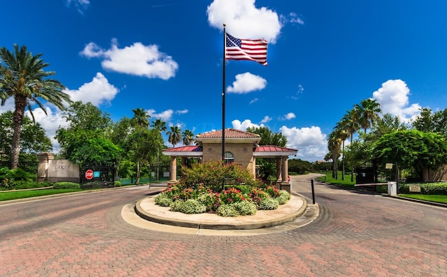 6338 Collina Springs Ct, Houston, TX 77041 - view of decorative street with curbs and a gated entry