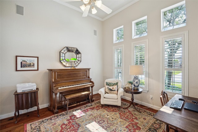 6338 Collina Springs Ct, Houston, TX 77041 - home office with wood finished floors, ornamental molding, a ceiling fan, plenty of natural light, and baseboards