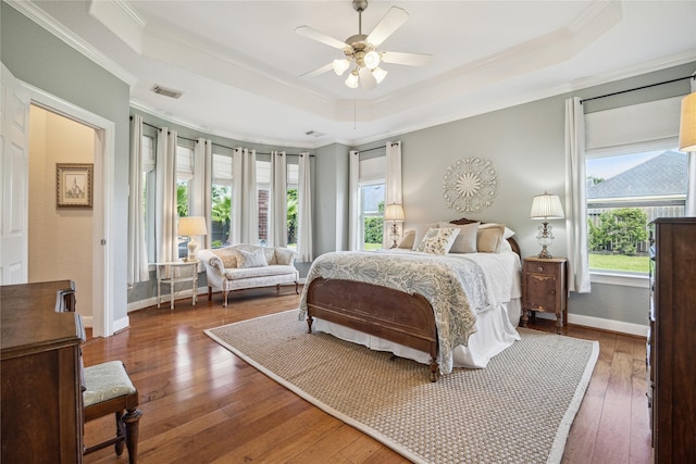 6338 Collina Springs Ct, Houston, TX 77041 - bedroom featuring a raised ceiling, ornamental molding, hardwood / wood-style flooring, baseboards, and a ceiling fan