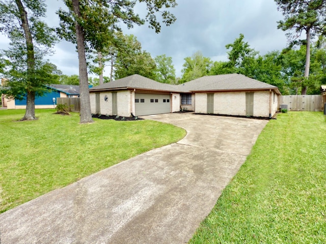 16007 Sailfin St, Crosby, TX 77532 - ranch-style home featuring concrete driveway, an attached garage, and brick siding