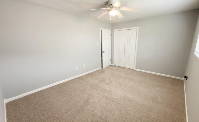 16007 Sailfin St, Crosby, TX 77532 - unfurnished bedroom featuring baseboards, light carpet, a closet, and ceiling fan