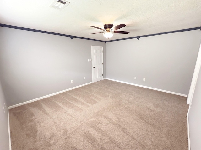 16007 Sailfin St, Crosby, TX 77532 - carpeted empty room with ornamental molding, a ceiling fan, and baseboards