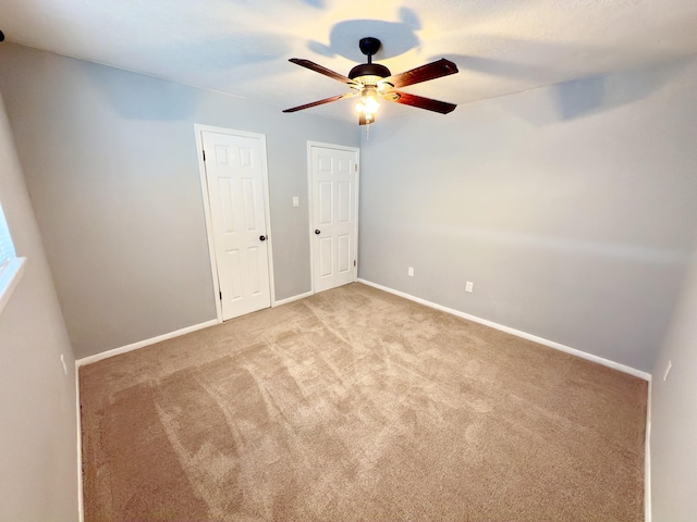 16007 Sailfin St, Crosby, TX 77532 - carpeted empty room featuring a ceiling fan and baseboards