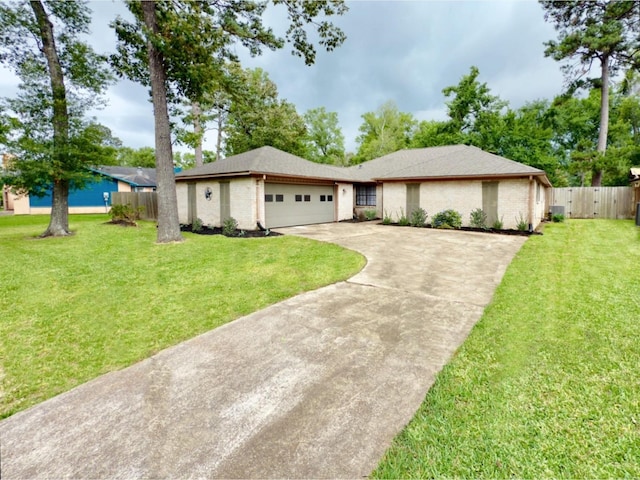 16007 Sailfin St, Crosby, TX 77532 - view of front facade with concrete driveway and an attached garage