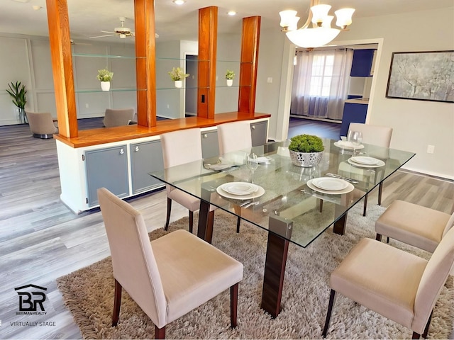 16007 Sailfin St, Crosby, TX 77532 - dining area featuring light wood-style floors, a chandelier, ceiling fan, and recessed lighting