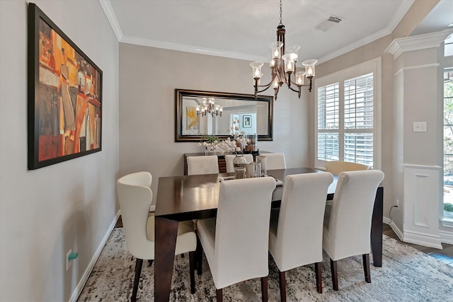 31 Brywood Pl, The Woodlands, TX 77382 - dining area with a chandelier, ornamental molding, and baseboards