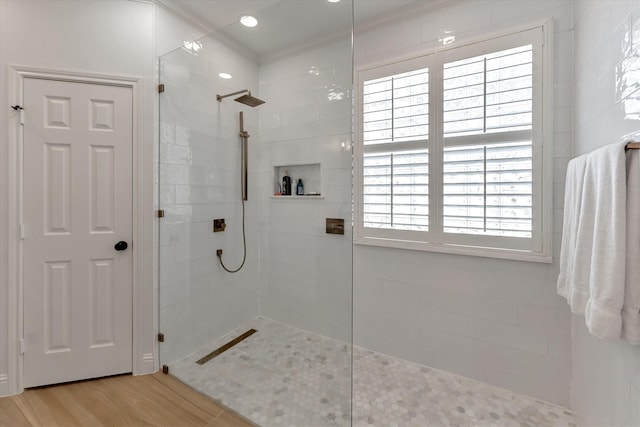 31 Brywood Pl, The Woodlands, TX 77382 - bathroom featuring walk in shower and wood finished floors