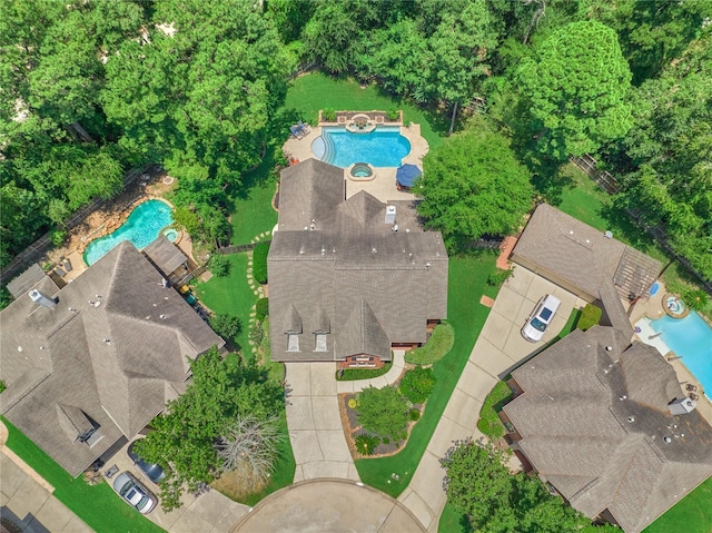 31 Brywood Pl, The Woodlands, TX 77382 - drone / aerial view of a pool area