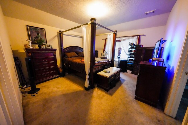 1819 Oxford Green Ct, Fresno, TX 77545 - carpeted bedroom with a textured ceiling
