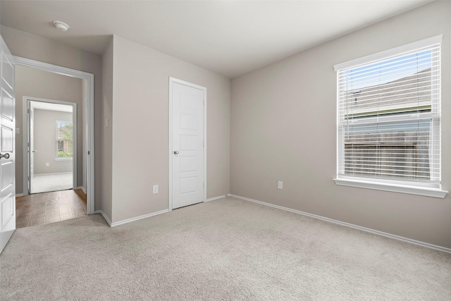 513 Bonnerville Ln, Magnolia, TX 77354 - unfurnished bedroom with carpet floors and baseboards