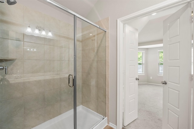 513 Bonnerville Ln, Magnolia, TX 77354 - bathroom featuring a stall shower and baseboards