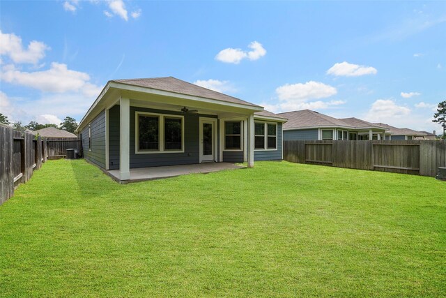 513 Bonnerville Ln, Magnolia, TX 77354 - back of house with ceiling fan, a patio, and central air condition unit
