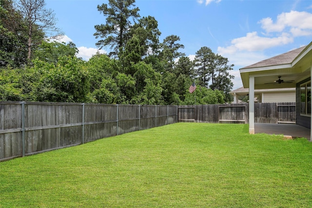 513 Bonnerville Ln, Magnolia, TX 77354 - view of yard featuring ceiling fan and a patio